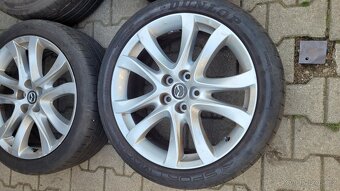Mazda R19 - bez plášťů - 2
