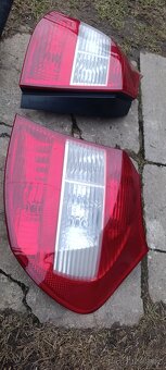 Kastlík/přihrádka do kufru BMW e87 - 2