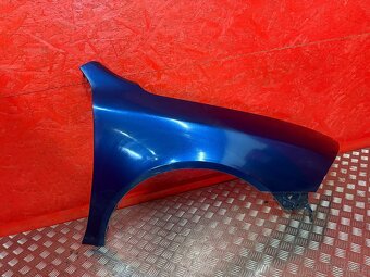 PRAVÝ PŘEDNÍ BLATNÍK ŠKODA OCTAVIA 2 9462 - 2