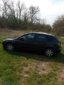 Mazda 3 sedan - 2