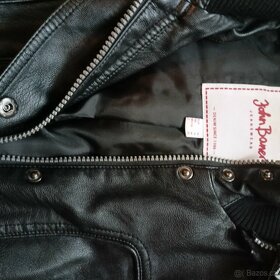 Teplá bunda z umělé kůže velikost je 44 - 2