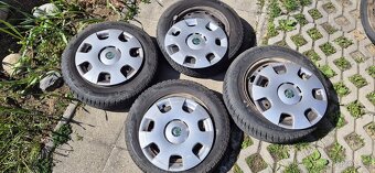 Zimní pneu 165/70r14 s disky fabia 1 + poklice - 2