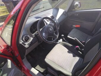 Prodám červené Suzuki SX4 - 2
