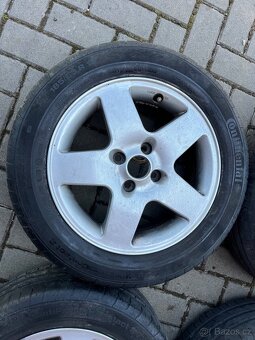 4x alu disky 4x100 R15, letní pneu 70% - 2