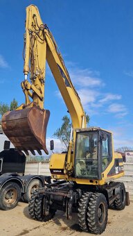 Predám kolesový Bager CATERPILLAR M 312 - 2