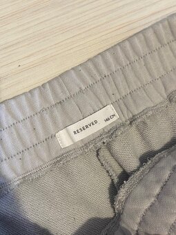 Dětské sportovní kalhoty. Velikost 146. - 2