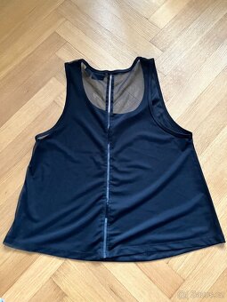 Dívčí funkční tílko vel. S - 2