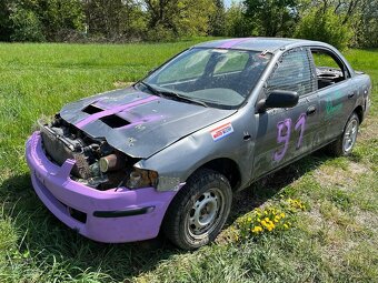 Mazda 323 1.8 84 kw autocross - 2
