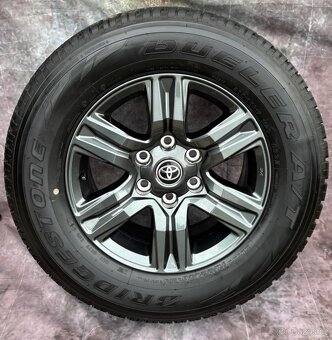 Zánovní alu Toyota Hilux 265/65R17 112S 99% VZORKU - 2