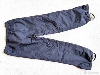 Dětské nepromokavé kalhoty Helly Hansen Shelter 134/9 - 2