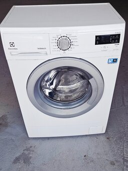 Úzká předem plněná pračku Elektrolux EWS1066SEU - 2