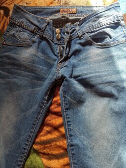 Riflové kalhoty. - 2