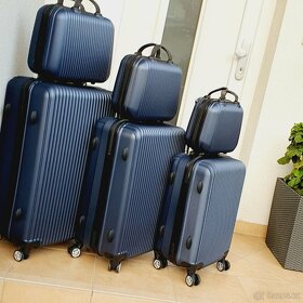 Cestovní skořepinové kufry - nové - 2