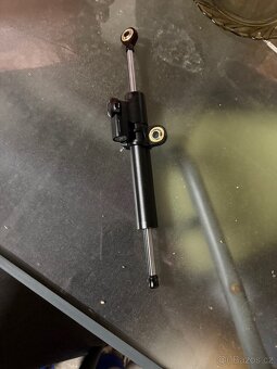 Tlumič řízení - 2