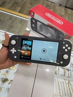 Nintendo Switch Lite, záruka 3/26 - 2
