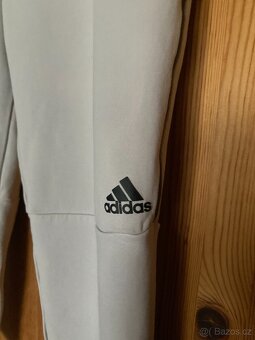Kalhoty - tepláky Adidas světle krémové - 2