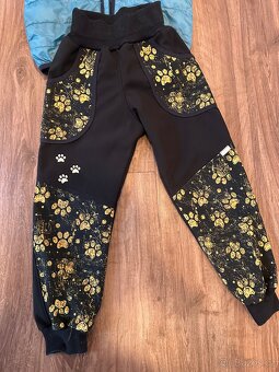 Péřová slabší bunda zn. HM a softshell kalhoty 122 - 2