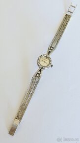Zlaté art deko hodinky zn Jaeger-LeCoultre brilianty 18 K au - 2
