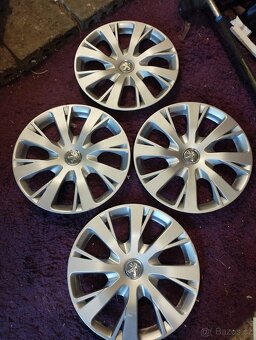 Poklice Peugeot.R/15.original. - 2