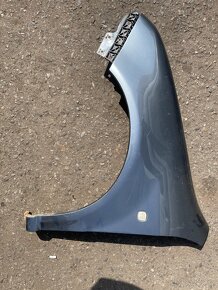 Levý přední blatník Fabia 9901 - 2