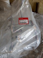 Honda PCX 125 leseni - drzak svetla original nove - 2