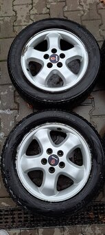 215/55/16 zimní sada Saab - 2