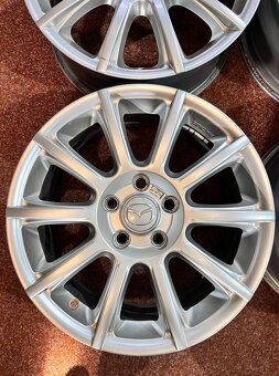 5x114,3 Mazda CX originál alu disky - ET 50 - 2