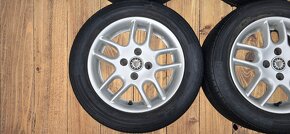 ALU 14" 4x100 ET38 s celoročními pneu 185/60/14 - 2