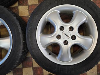 alu kola 16 5x110 6Jx16 et 49 Opel Ronal 205/55/16 - 2