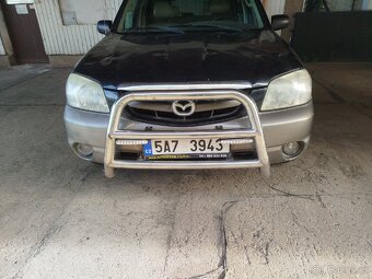 Rám Mazda tribute - 2