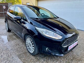 Ford Fiesta 1.6TDci 70kW. 2013, navi, klima - 2