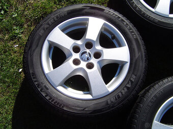 4XLETNÍ HLINÍKOVÁ KOLA ŠKODA FABIA II,III 185/60 R14 - 2