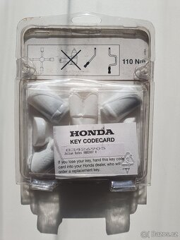 Honda pojistné matice stříbrné 08W42-SJD-600 - 2