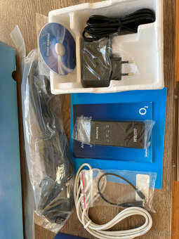 Modemy a eet top box + různé kabely - 2