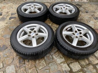 Sada alu kol Alutec 15" s letními pneu Nokian 185/60 R14 - 2