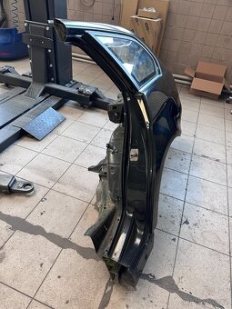 Čtvrtka (levá zadní blatník) BMW E91 - 2