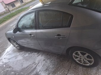 Mazda 3 sedan - 2
