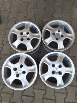 ALU disky 15", rozteč 4x100, ET 35 - 2