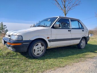 Subaru Justy 1,2 4WD CVT - 2
