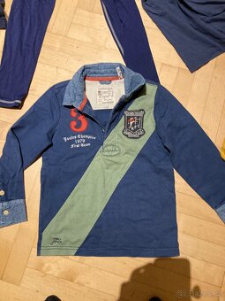 Balík věcí kluk 122,128 - 2