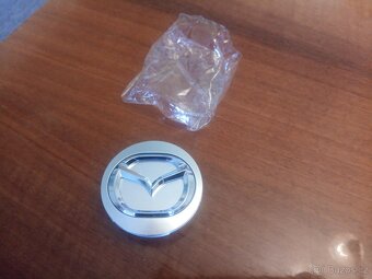 MAZDA - krytky středové díry kola, disku 4ks nové - 2