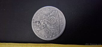 Mince Trade dollar z roku 1873 - 2