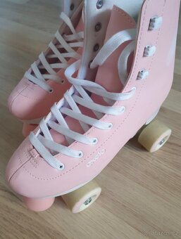 Oxelo růžové kolečkové brusle - 2