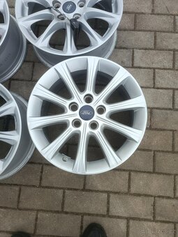 214. Originál ALU kola Ford 5x108 R16 - 2
