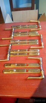 Mosazné kování , kliky na dveře. 5x - 2