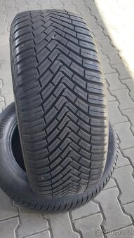 Prodám 2 x celoroční pneu Continental 235/55/18 - 2