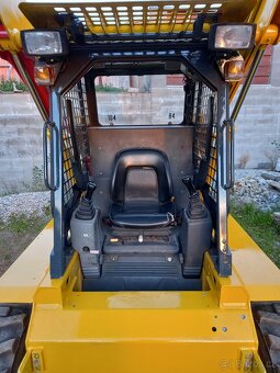 smykový nakladač  KOMATSU SK 09 - 2