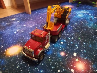 Brüder-kamion Mack+pásový bagr CAT - 2