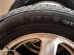 pneu Nokian na orig. alu discích - 2