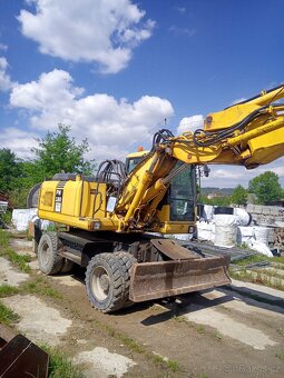 Kolový bagr Komatsu PW 180 - 2